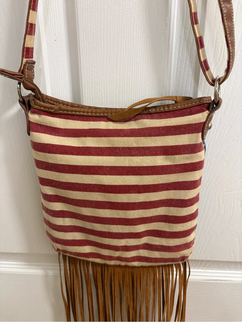 Retro crossbody Stars and Stripes bag with fringe, note striped underside strap